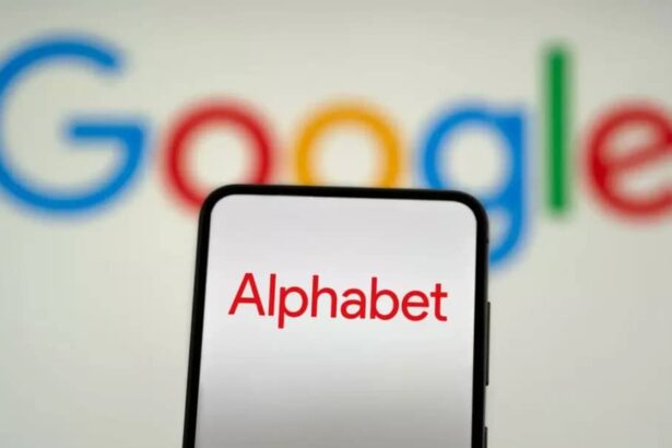 Alphabet photo showing google logo and a phone with alphabet written on it