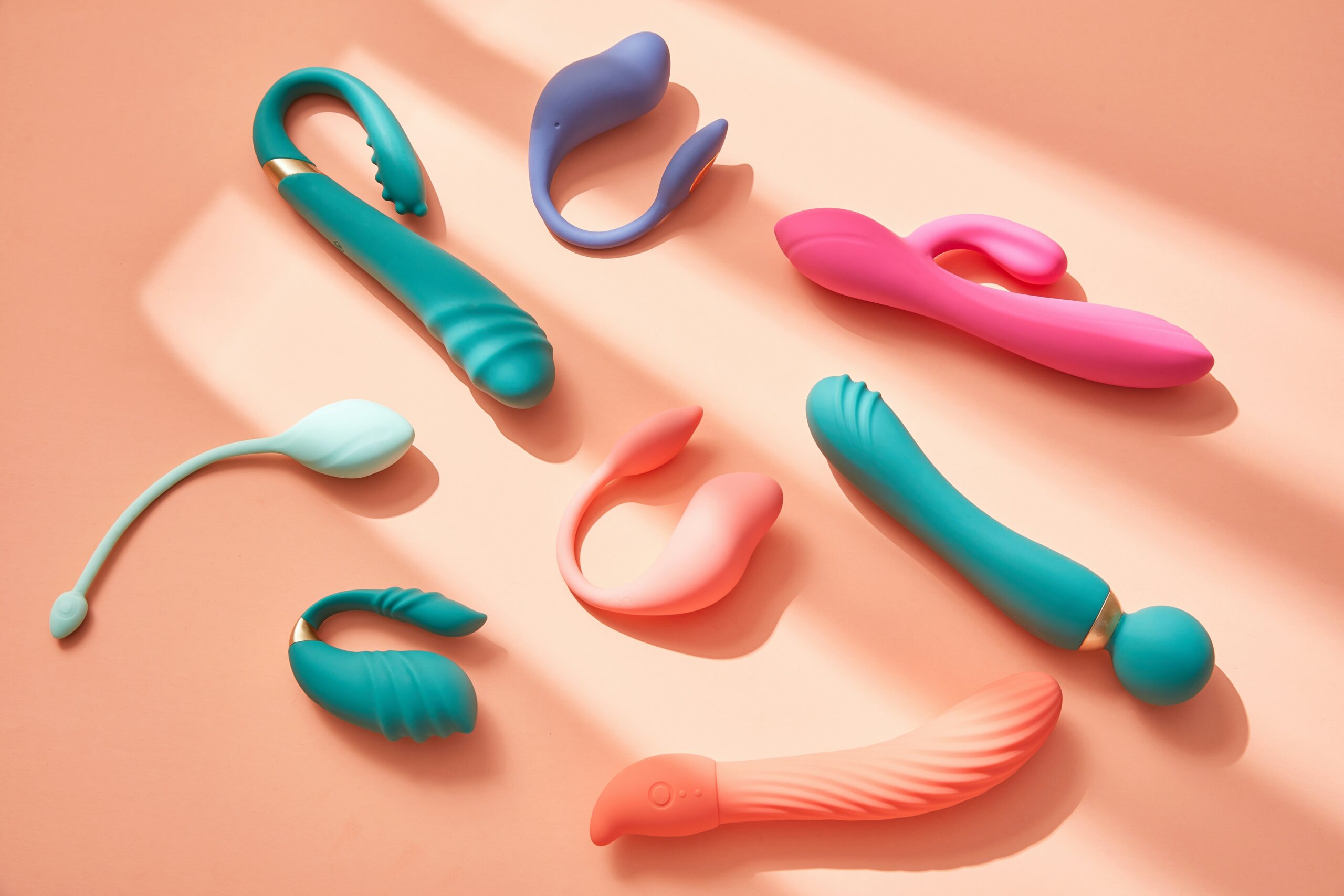 Sex toys been displayed on a pink background